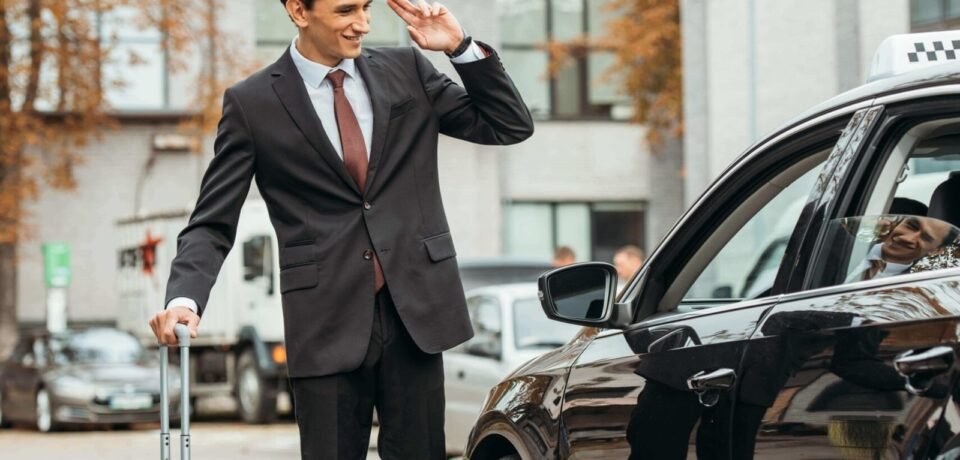 businessman-with-suitcase-smiling-to-taxi-driver-2024-11-12-00-46-47-utc-scaled-1.jpg businessman-with-suitcase-smiling-to-taxi-driver-2024-11-12-00-46-47-utc-scaled-1.jpg
